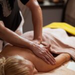 young-woman-enjoys-massage-spa_144627-2255